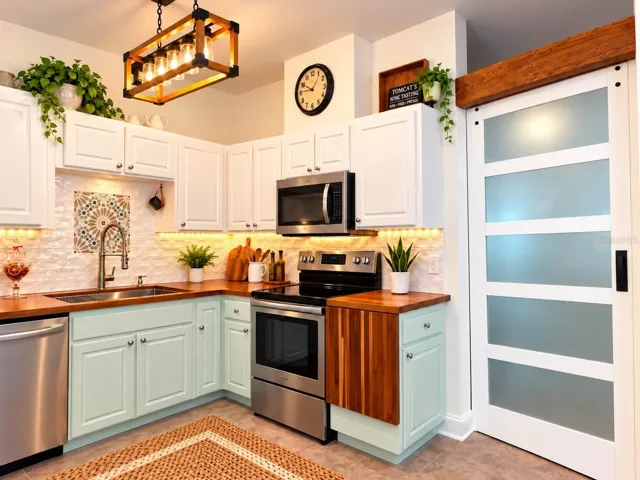 Modern Farmhouse Kitchen with deep undermount one single ss sink and farmhouse lighting