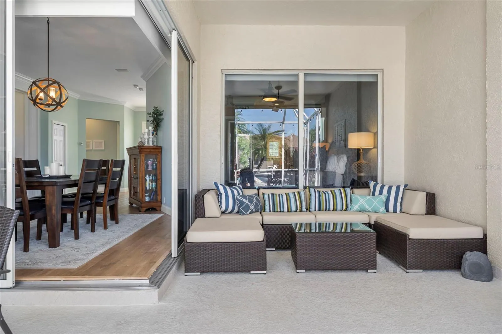 An inviting covered nook extends your living space outdoors—perfect for a good book or catching up with friends.