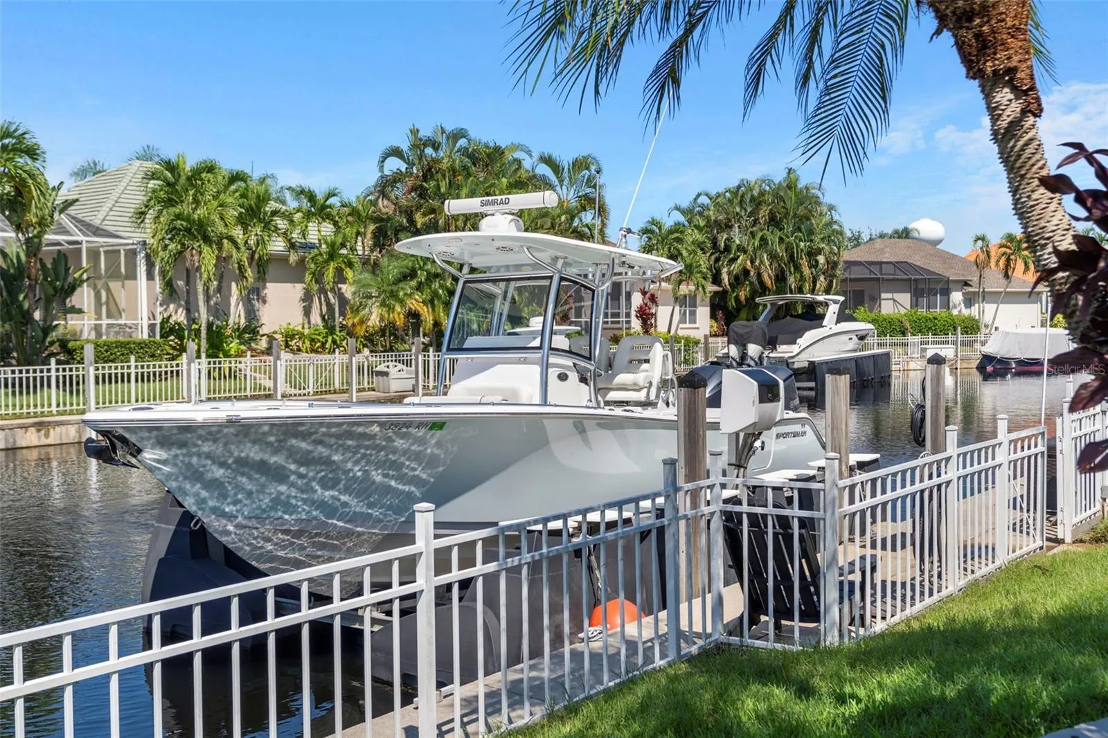 Your private dock includes water and electric, adding everyday convenience to life along the canal.