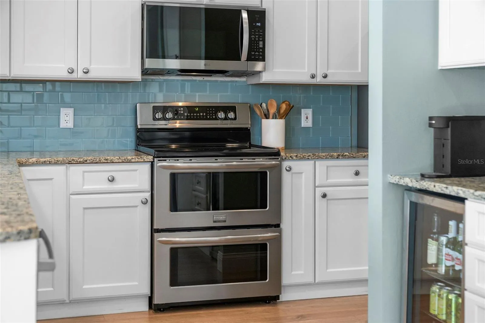 A stainless steel double-oven range offers welcome flexibility for everyday cooking and holiday gatherings.