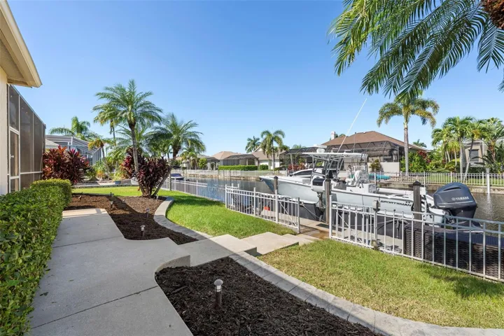 Keep your boating plans close to home with a private dock just steps from the backyard.
