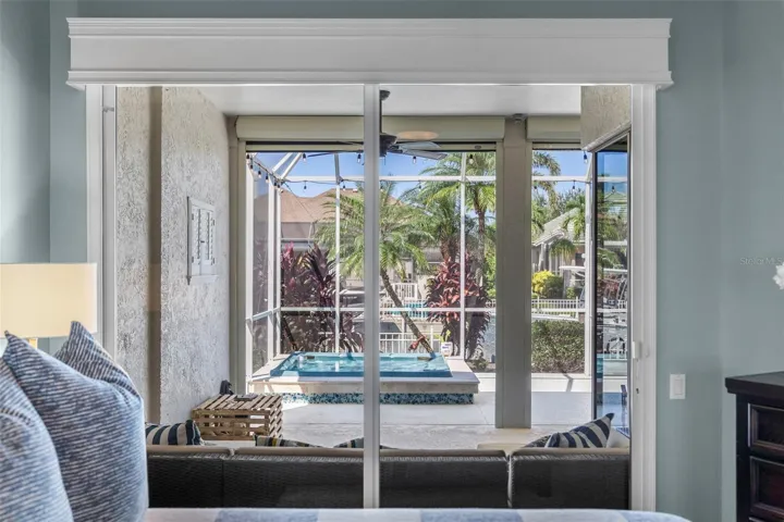 Step outside from your bedroom to enjoy the covered lanai, heated spa, and tropical surroundings.