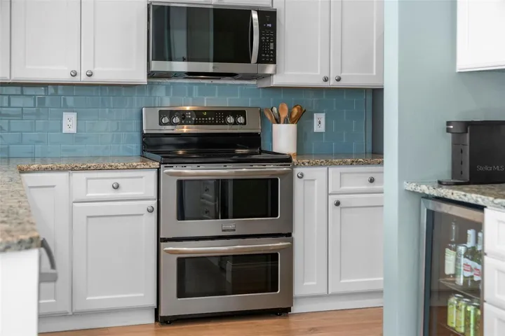 A stainless steel double-oven range offers welcome flexibility for everyday cooking and holiday gatherings.