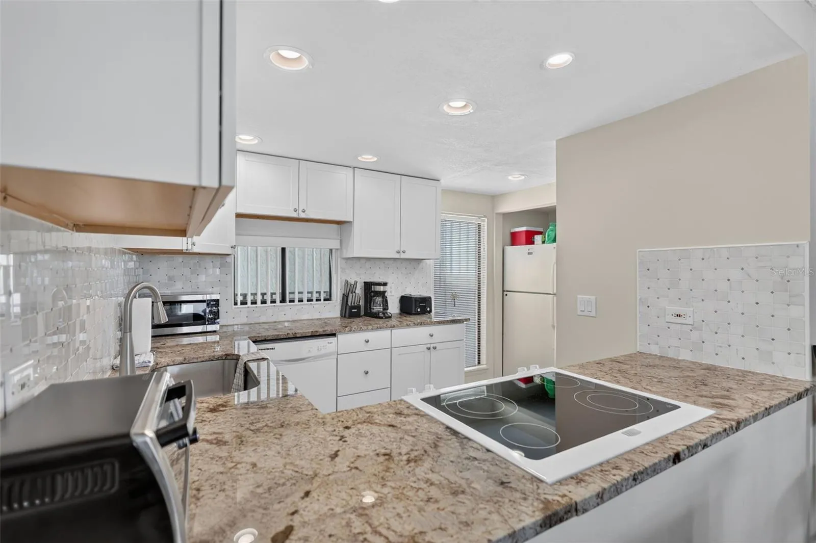 Thoughtfully designed kitchen layout optimized for functional ease and convenience.