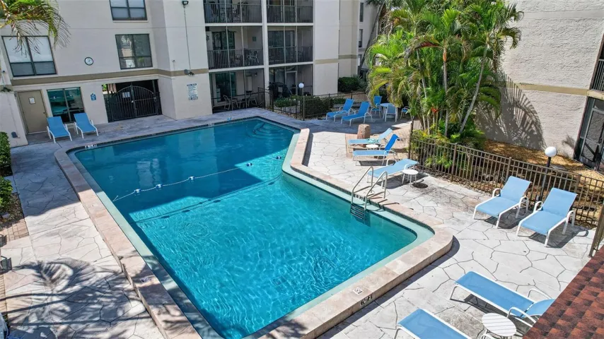 Plenty of lounge chairs surrounding the pool, perfect for soaking in the sun.
