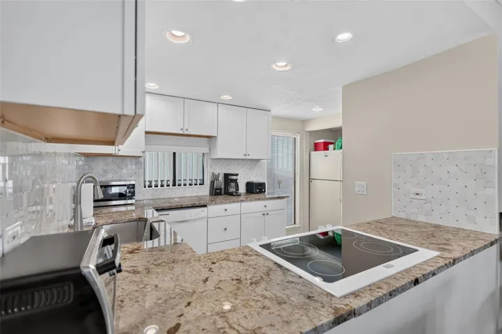 Thoughtfully designed kitchen layout optimized for functional ease and convenience.