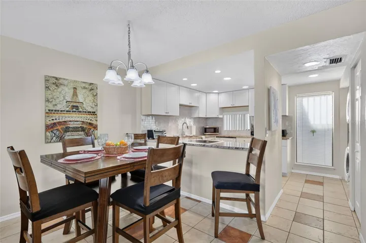 Open-concept kitchen and dining area featuring a seamless flow perfect for entertaining.
