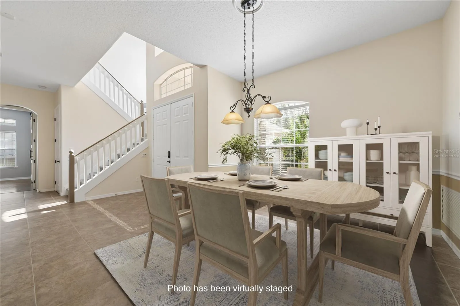With the open concept your formal dining room will feel very spacious (photo virtually staged).