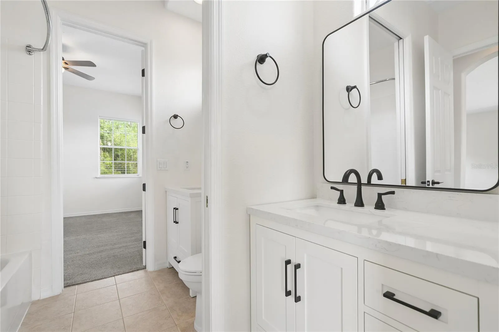 Bathroom 4 is a shared ensuite between bedrooms 3 & 4, each side has their own vanity area, and the bath/shower and toilet are shared.