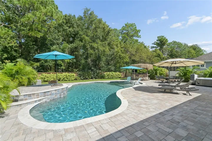 This is the deep end of the pool going down 6 ft but has a bench to sit on so you can rest and enjoy the sun.