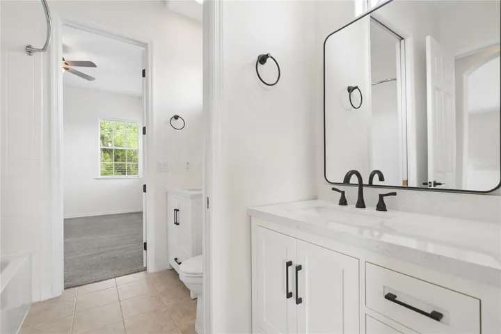 Bathroom 4 is a shared ensuite between bedrooms 3 & 4, each side has their own vanity area, and the bath/shower and toilet are shared.