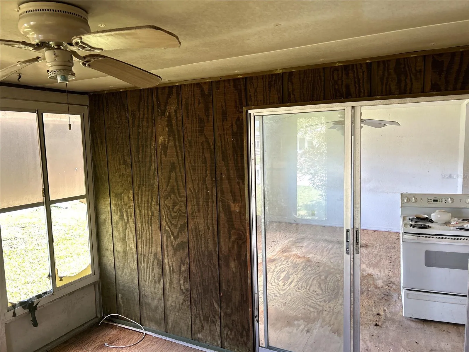 another view of screened porch into living area.