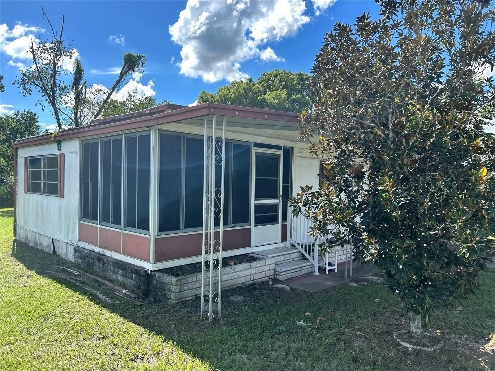 view of screened porch and living room.