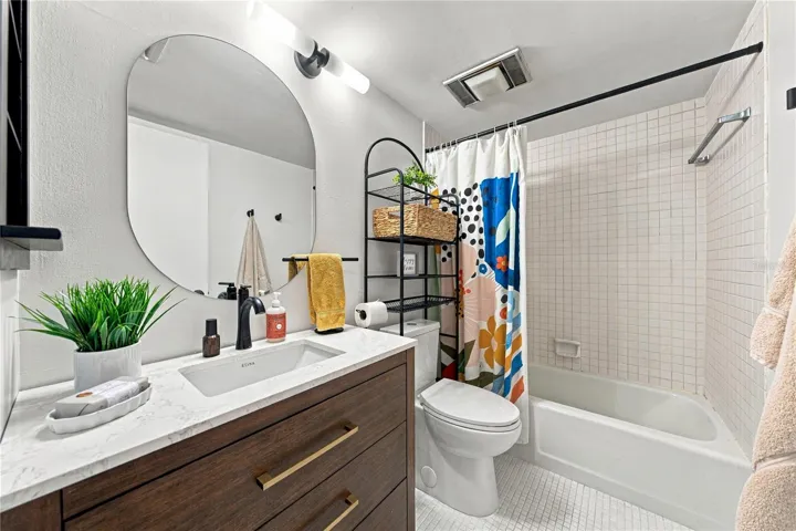 Remodeled Second Bath with Beautiful Vanity and Tub &amp; Shower.