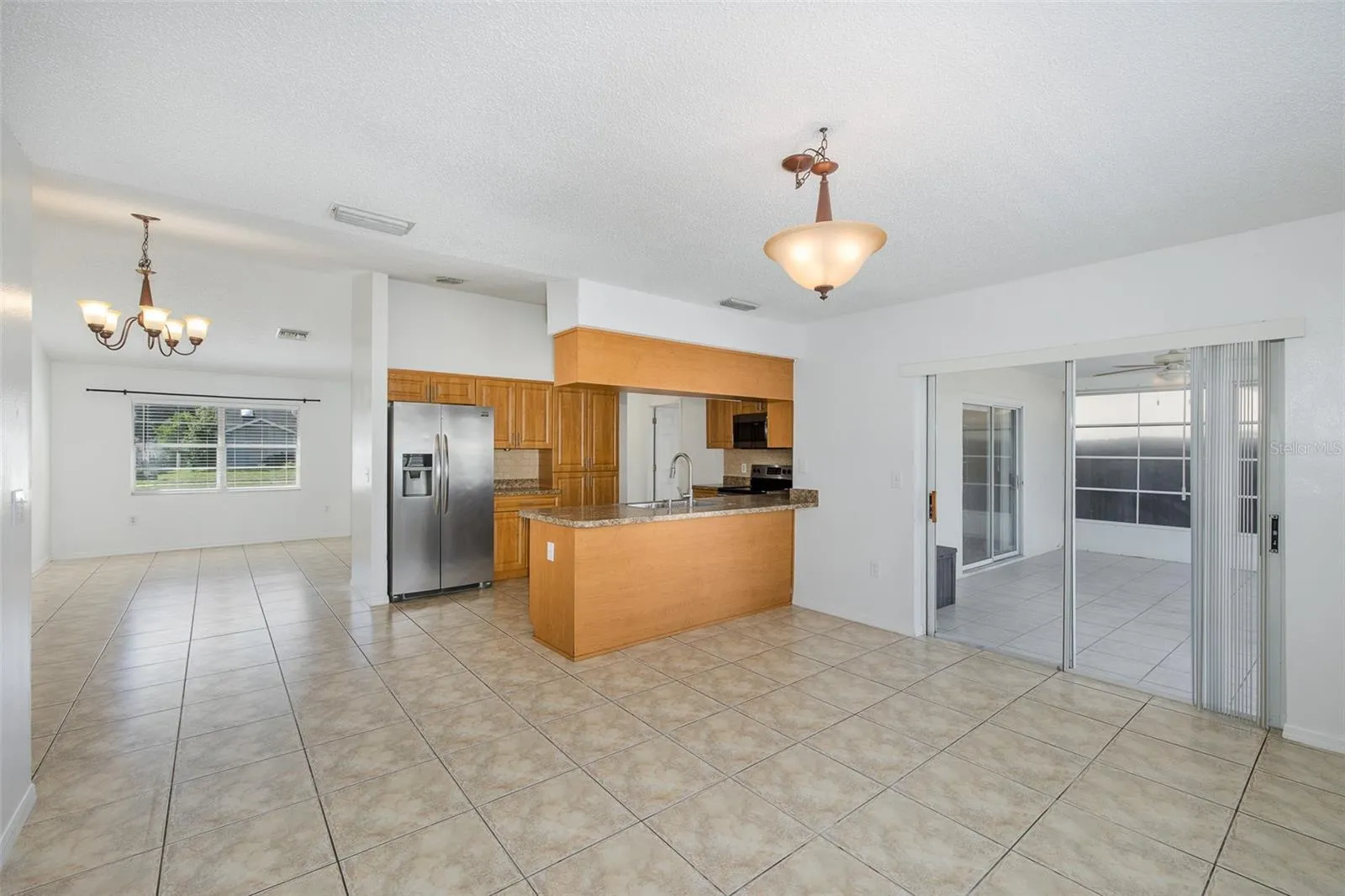 Family room overlooking the kitchen and dining