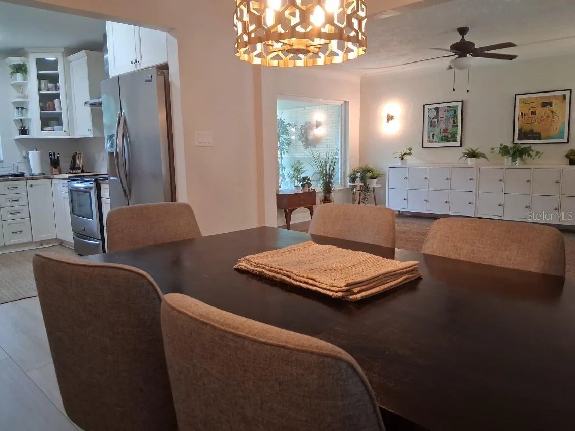 Dining room is open to the kitchen, and the great room, yet has its own designated space