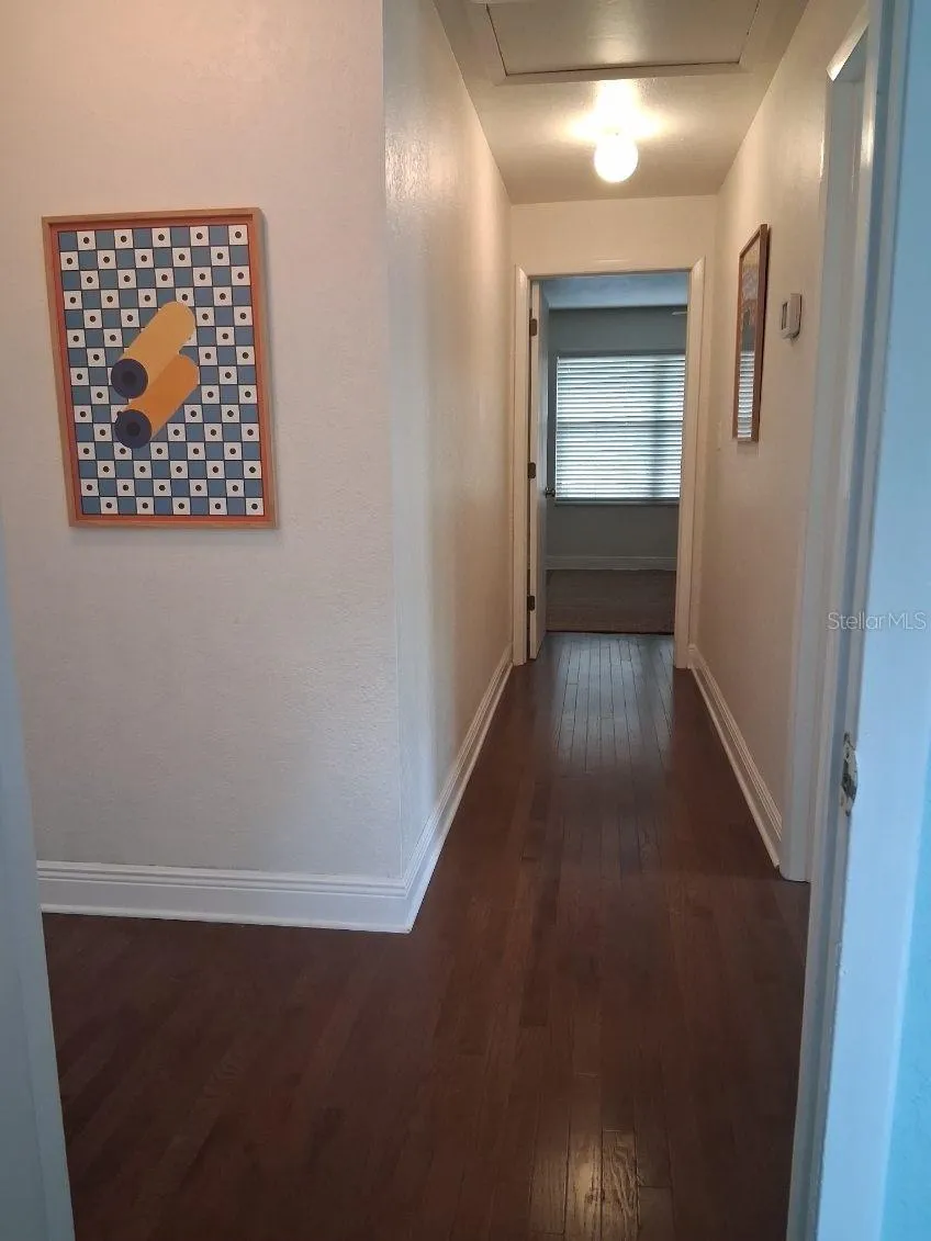 Upstairs Hallway with gleaming hardwood floors