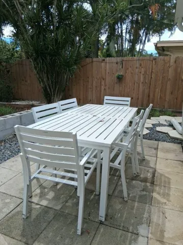Room for dining outside, or working, or enjoying the abundant greenery, salt breeze off the water, and chirping parrots that also live in Jungle Prada