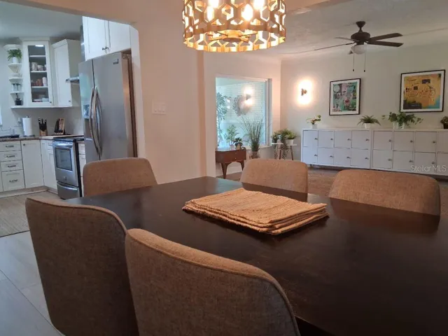 Dining room is open to the kitchen, and the great room, yet has its own designated space