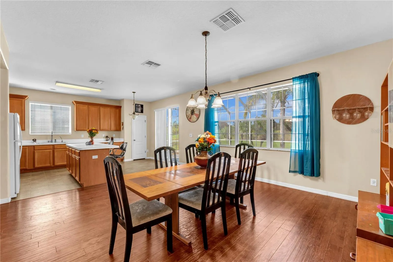 The generously sized dining room offers even more space to bring everyone together, making this home an entertainer's dream.