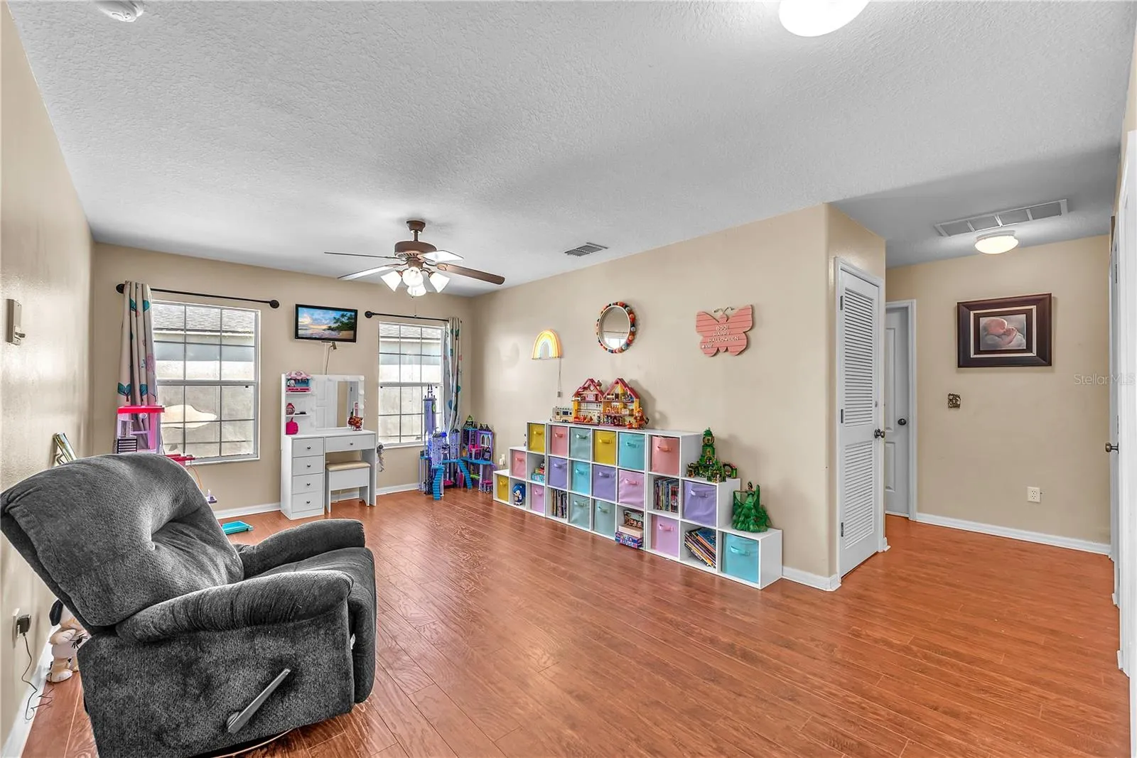 The upstairs bonus room adds yet another dimension to this home's versatility.
