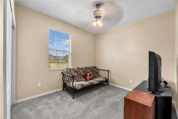 A downstairs bedroom and full bathroom provide wonderful flexibility for overnight guests, multigenerational living, or a private home office.