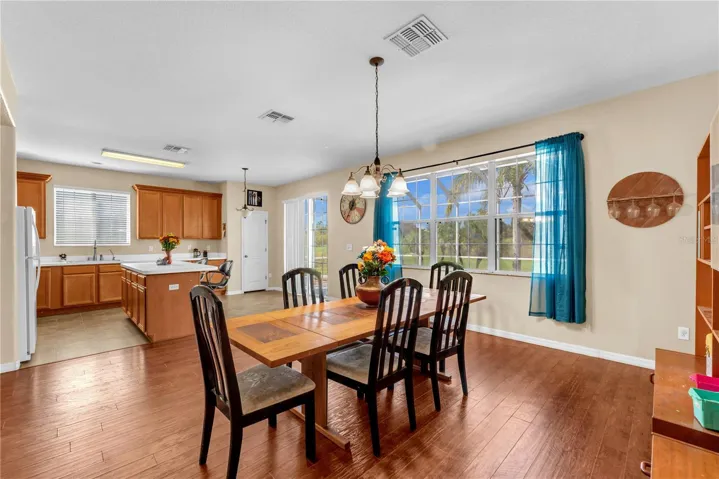 The generously sized dining room offers even more space to bring everyone together, making this home an entertainer's dream.