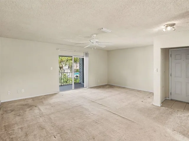 Living Room Access to Balcony w/Storage Closet