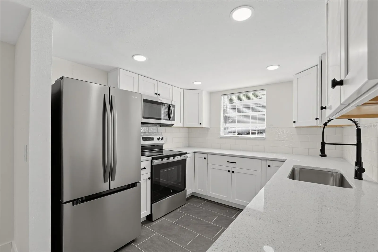 "Brand new kitchen appliances throughout"