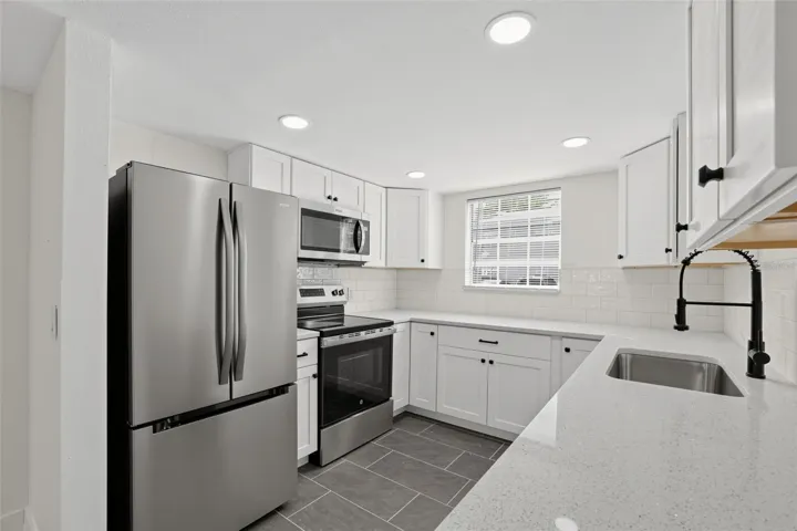 "Brand new kitchen appliances throughout"