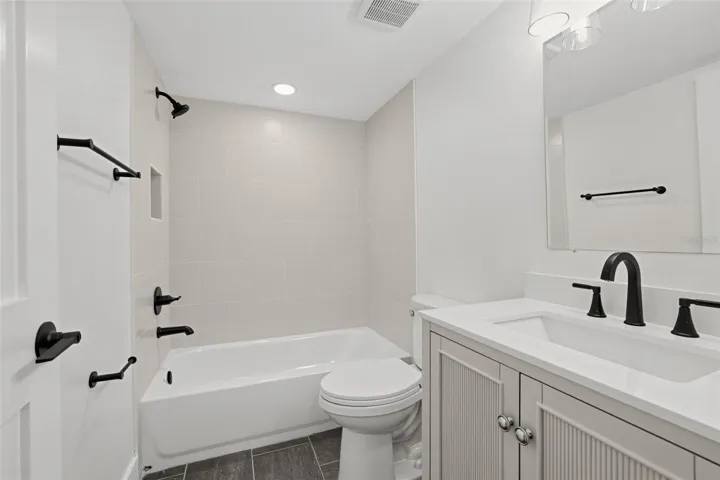 "Guest bath with tub/shower combo"