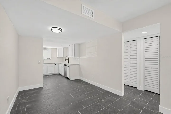 "Living area with sliding glass doors"