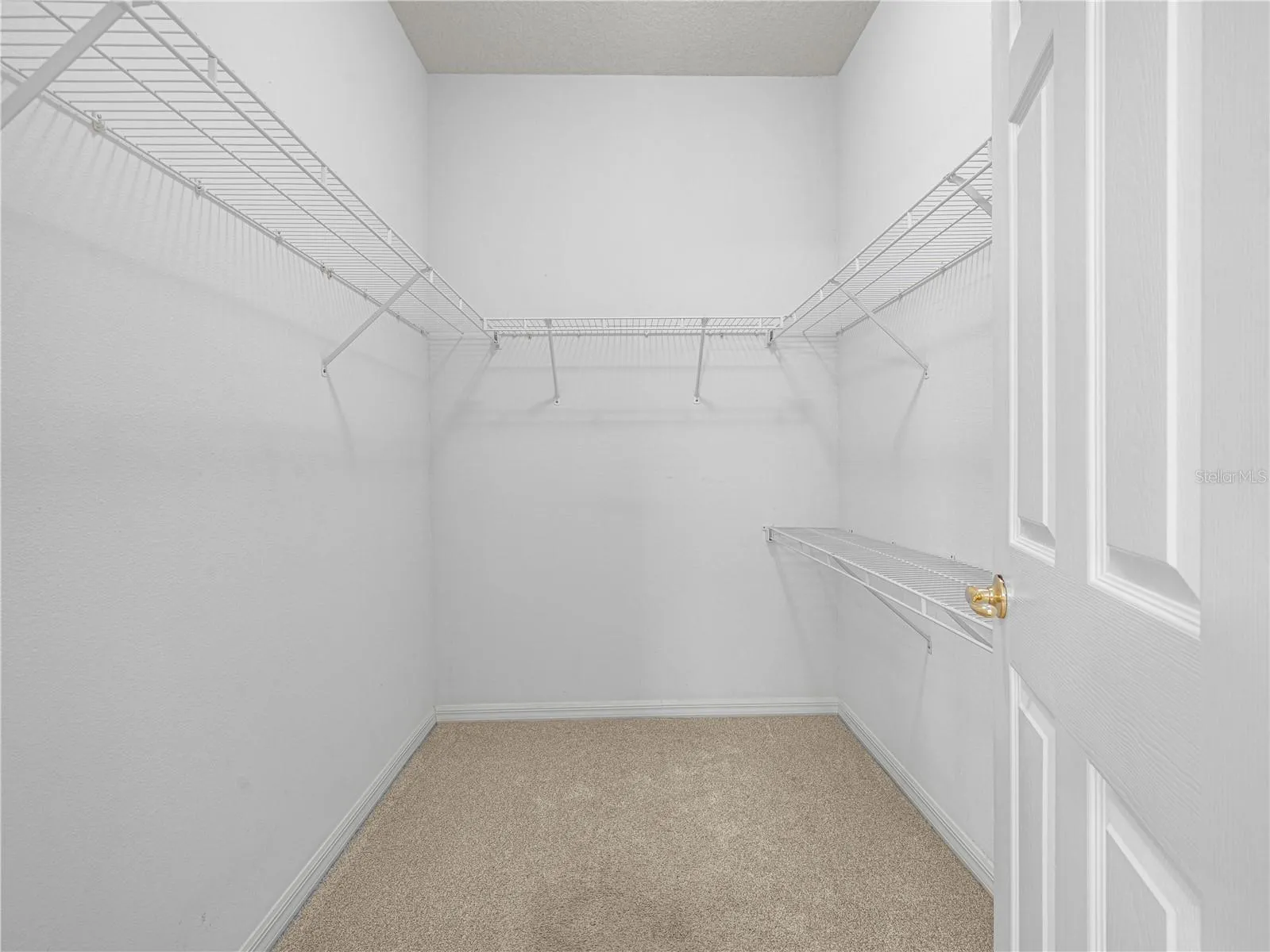 His/Her Walk In Closet in Primary Suite
