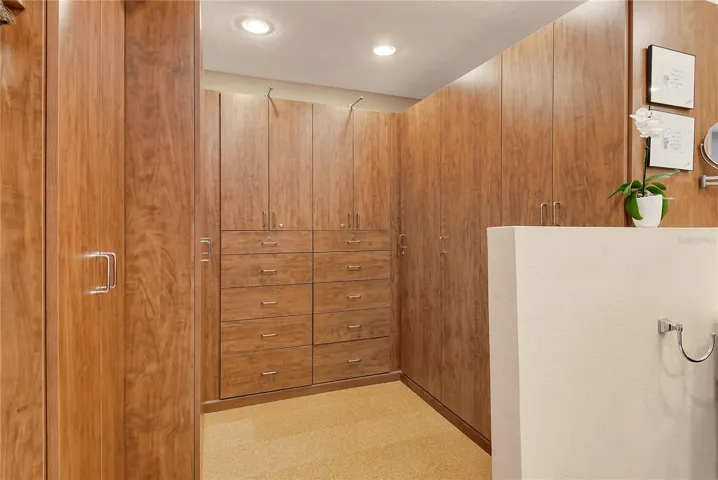 "En Suite" Bathroom with High End Built-in Closet System!