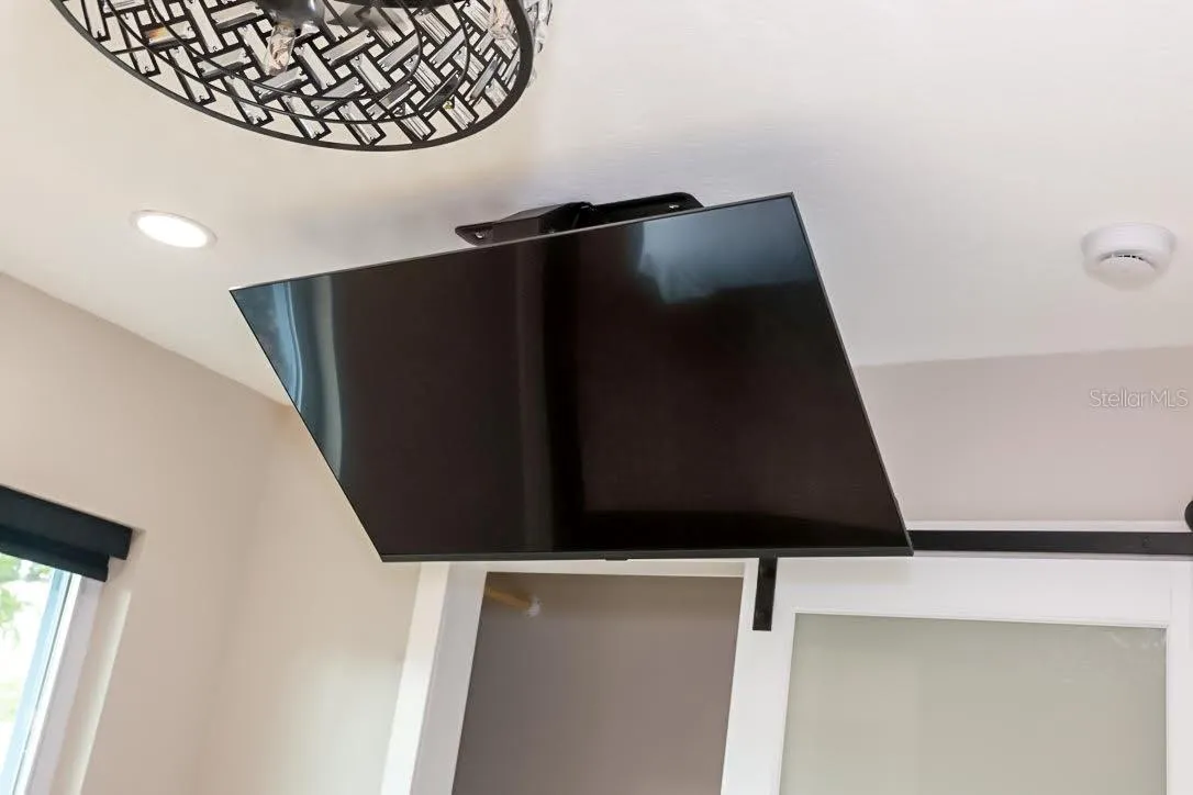 Remote controlled TV mounting system