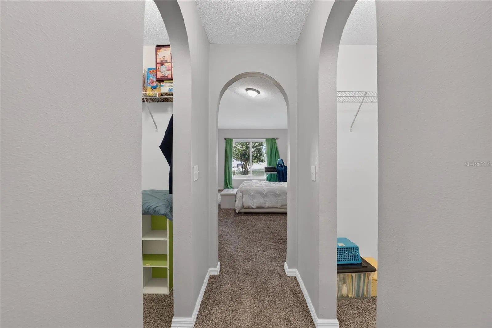 Primary Bedroom - Dual Walk-In Closets