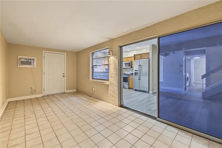Side patio off of the kitchen.