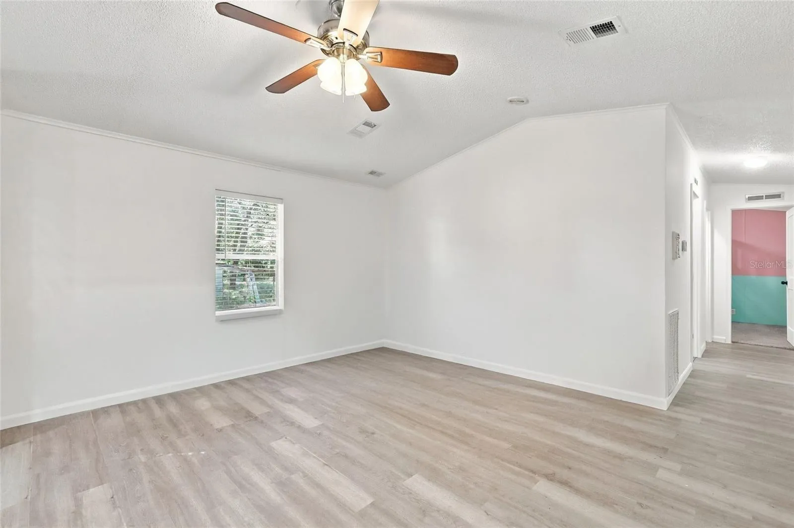 living room/ hallway to 2 guest bedrooms & guest bath