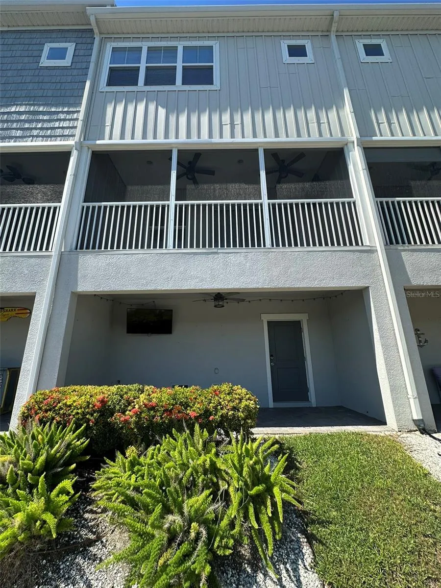 Back side of townhome, two outdoor spaces on the water