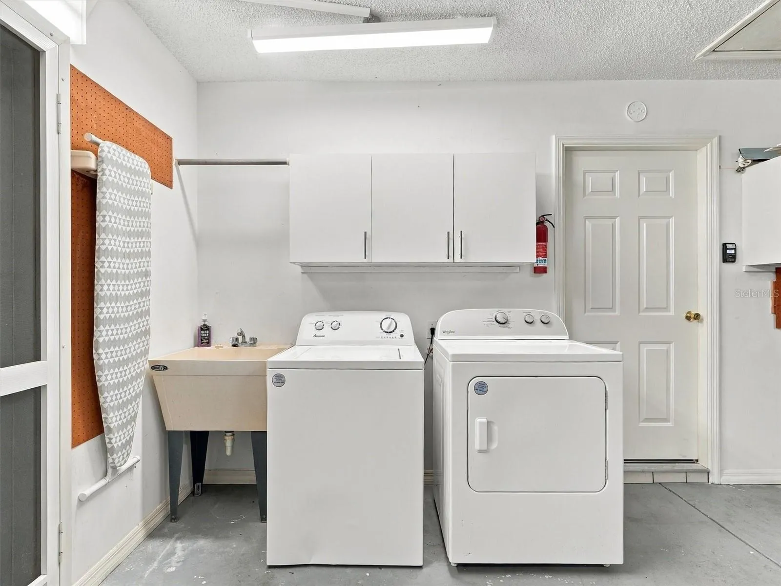 Washer &amp; Dryer, and Wash Tub - side door in garage