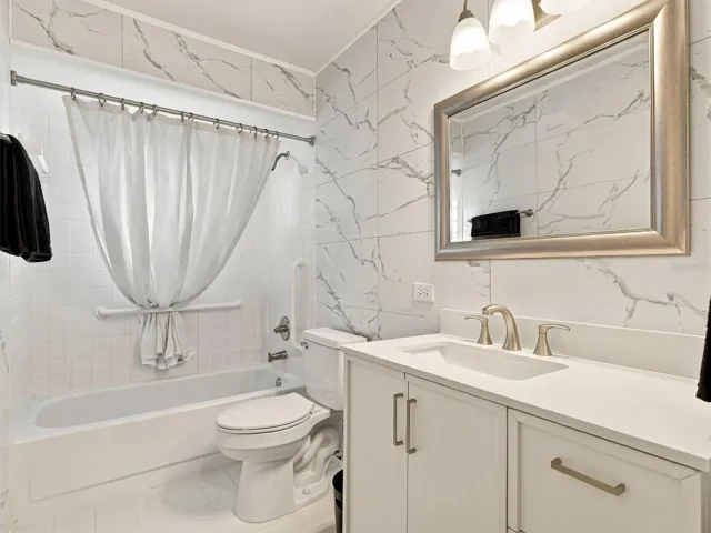 Guest Bathroom - updated with new vanity, wall tiles, mirror, toilet