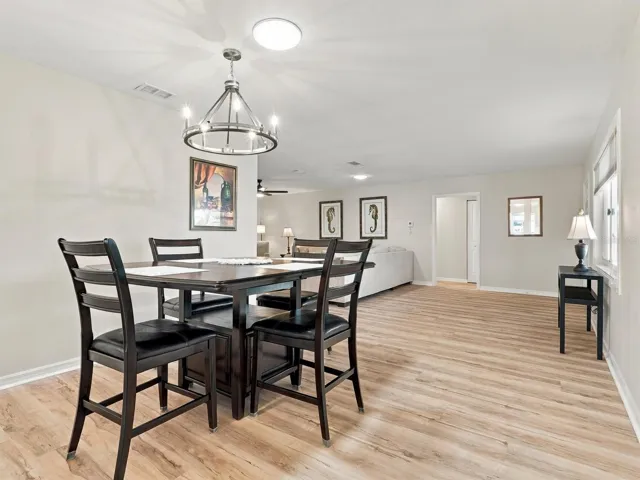 Dining Room with Table for 4 and Solar Tube and New Light Fixture