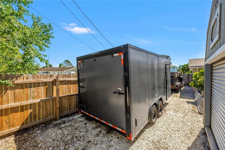 The current owner has two of his trailers parked here and plenty of room left over. You could fit all sorts of big toys back here, protected by a locked access gate up front.