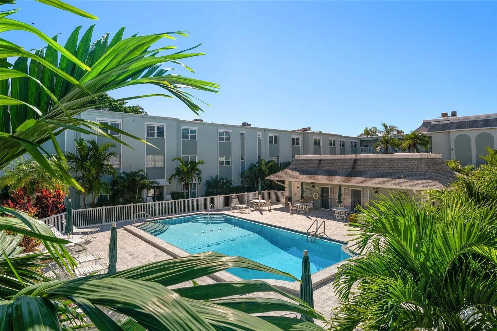 Heated pool and clubhouse, lush landscaping