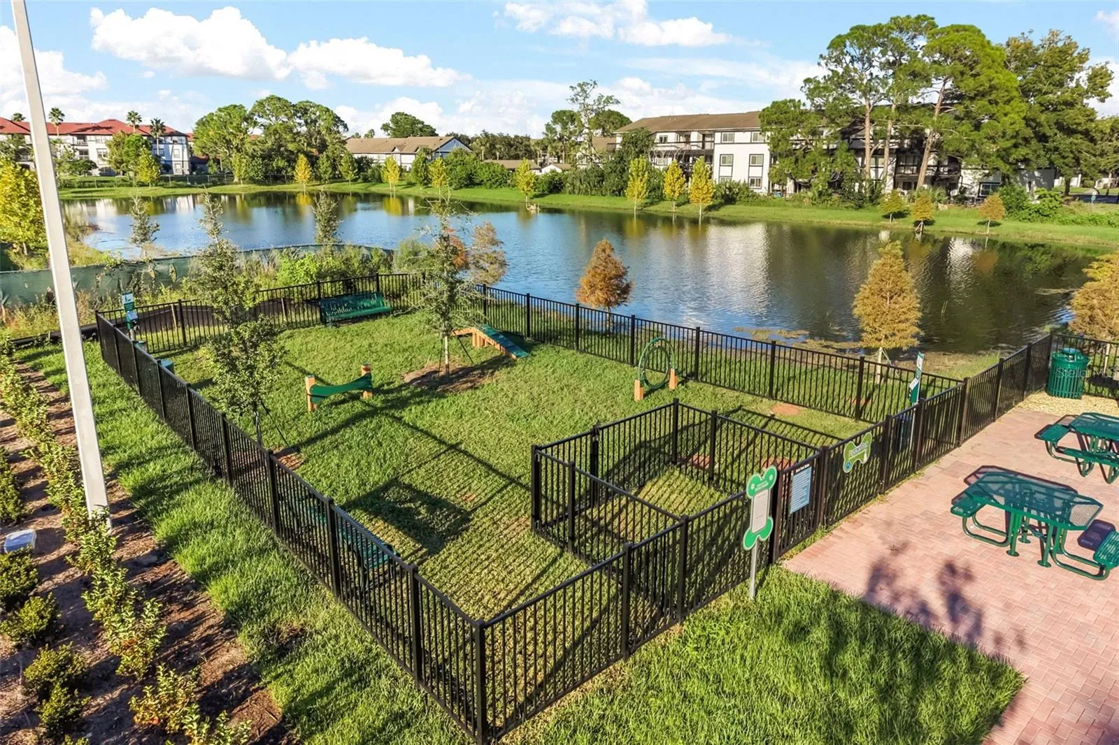 Enjoy a lifestyle that extends beyond your front door with resort-inspired community amenities, including two swimming pools, clubhouses, a scenic walking trail surrounding the community pond, dual tennis and pickleball courts, a dedicated dog park, and playgrounds.