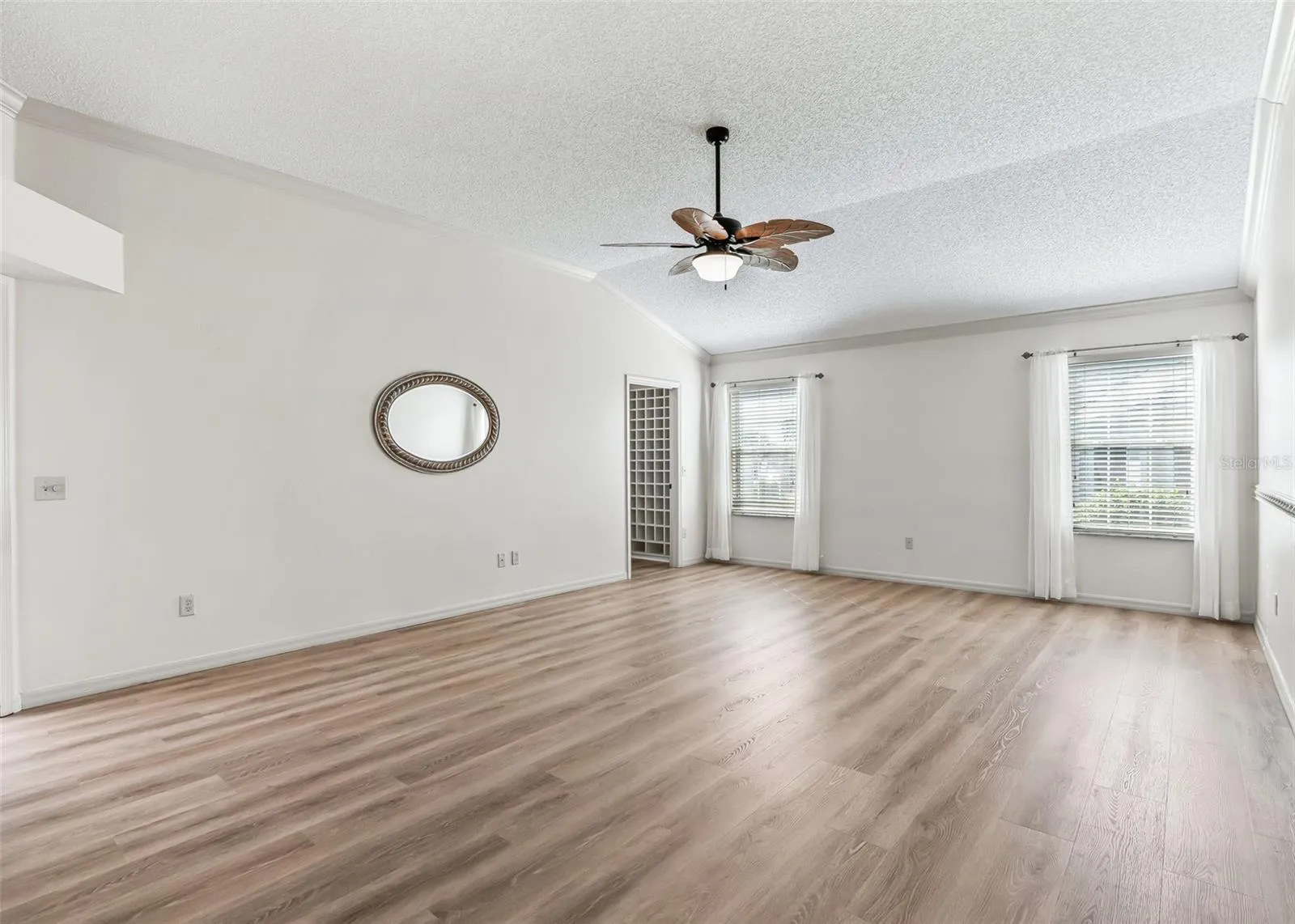 LVP Flooring. Corner Walk-In Closet