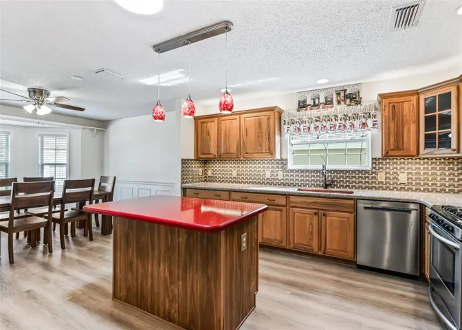 Kitchen Island &amp; Wood Cabinets.