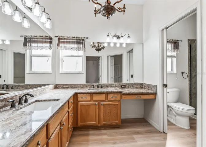 Double Sinks. Granite Counters. Make-Up Vanity