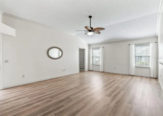 LVP Flooring. Corner Walk-In Closet