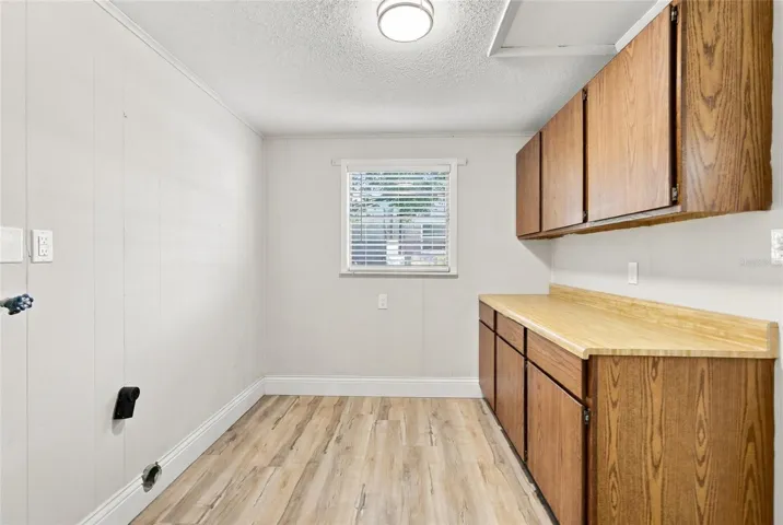 Inside utility with washer and dryer hookups.